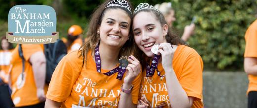 Two women with their medals at The Banham Marsden March