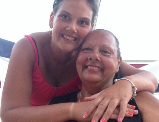 Image of Julie being embraced by her daughter