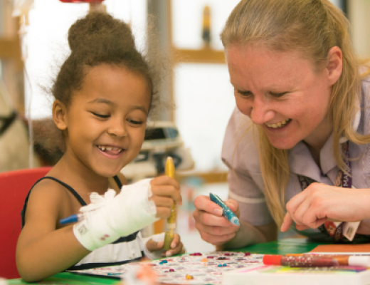 Image of Pippa playing games with a nurse