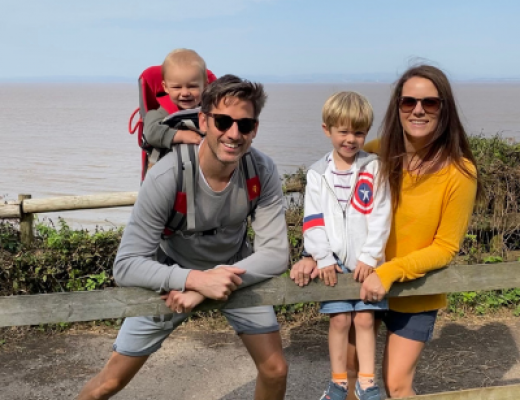 Image of Natalie enjoying a day out with her husband and two sons.
