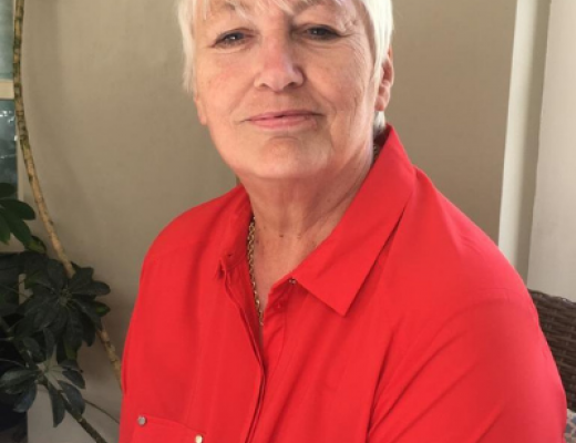 pam in red shirt