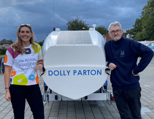 Charlotte Irving and her dad Colm Irving with the boat named Dolly Parton