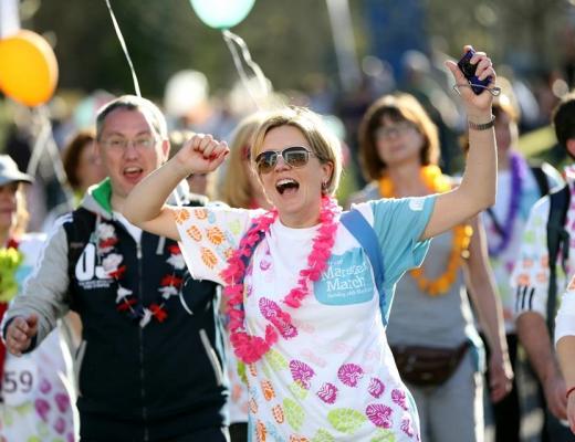 Laura Parker crossing the finish line at the Banham Marsden March