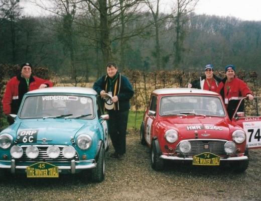 Tony, Phil and two friends with their cars before a race