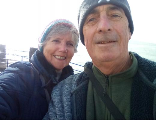 Selfie of Andy Johnstone with his wife Tricia outside wearing winter hats and coats