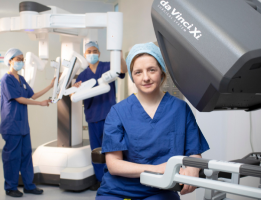 Robotic surgeons in Blue Royal Marsden scrubs with the Da Vinci Xi cancer surgery robot