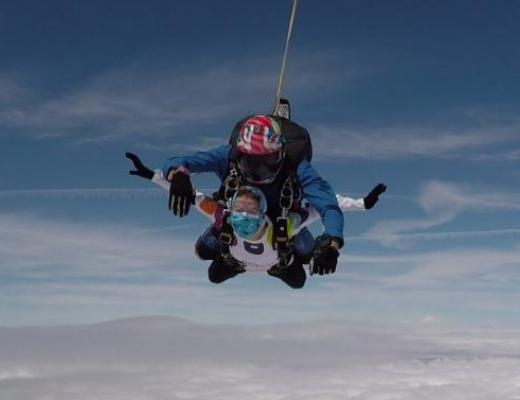 two people tandem skydiving for The Royal Marsden Cancer Charity