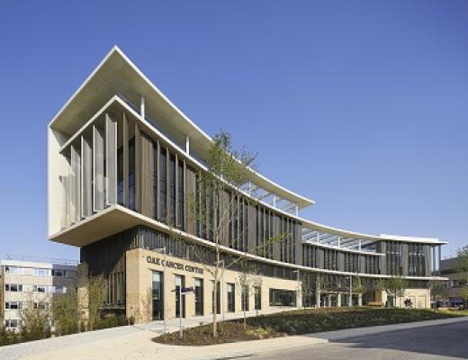 The exterior of The Royal Marsden's Oak Cancer Centre on a bright, sunny day