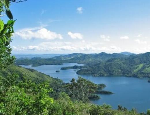 View of coastline and islands with blue sky 